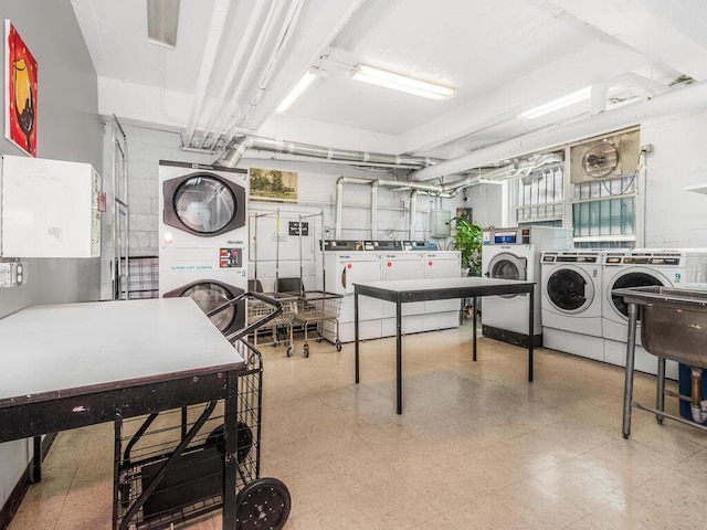 3065 Sedgwick Ave Unit 3A, Bronx, NY 10468 - shared laundry room with washing machine and clothes dryer, estacked washer and dryer, and light flooring
