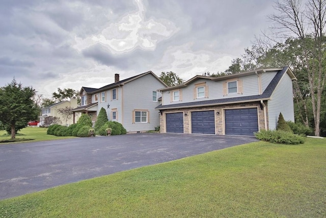 168 S Centerville Rd, Middletown, NY 10940 - view of front of home featuring driveway, a garage, and a front lawn