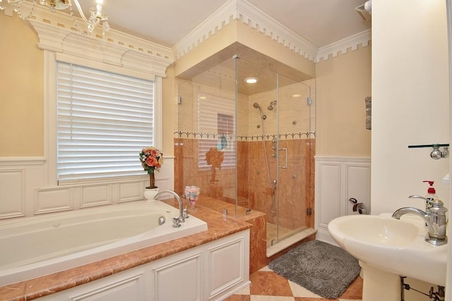 168 S Centerville Rd, Middletown, NY 10940 - full bathroom featuring a bath, a stall shower, a decorative wall, a wainscoted wall, and ornamental molding