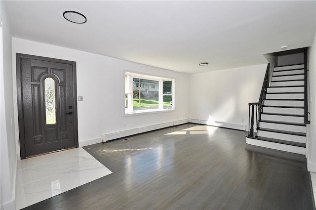 foyer with dark hardwood / wood-style flooring