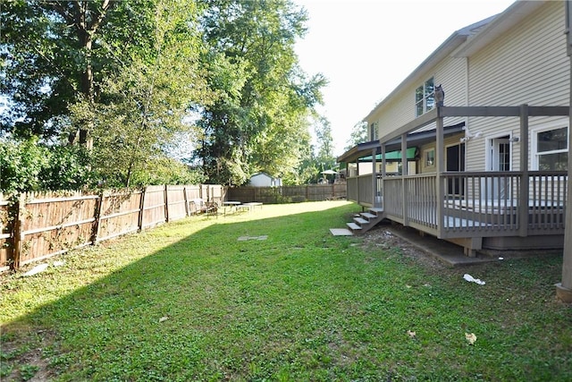 view of yard with a deck