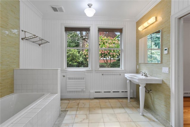bathroom featuring visible vents, a baseboard radiator, a relaxing tiled tub, and ornamental molding