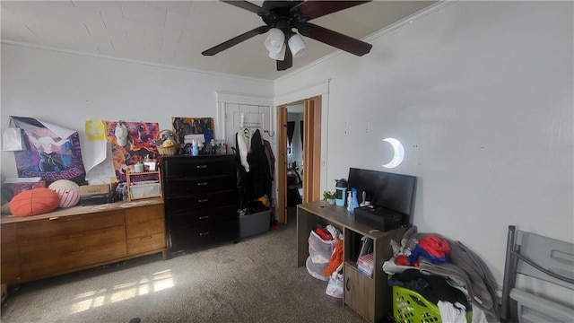 bedroom featuring carpet flooring, a ceiling fan, and ornamental molding