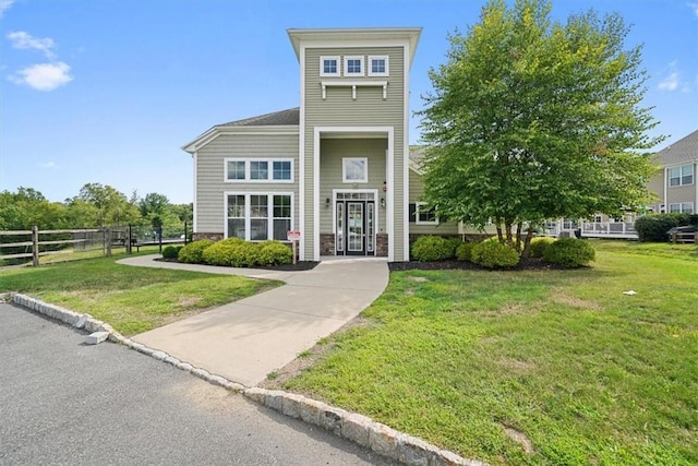 view of front of home with a front yard