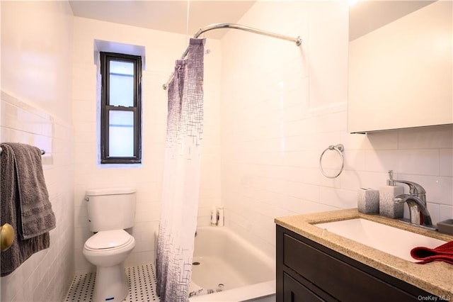 full bathroom featuring shower / bath combination with curtain, toilet, tile walls, and vanity