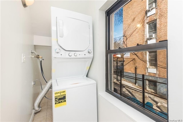 204 W 260th St, Bronx, NY 10471 - laundry area with stacked washer / drying machine and tile patterned floors