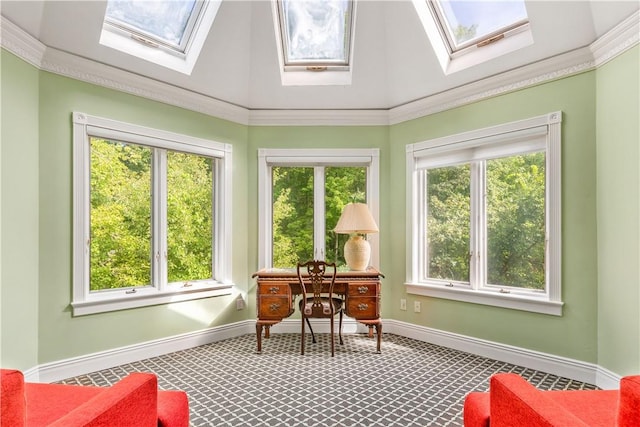 sunroom / solarium featuring plenty of natural light and vaulted ceiling with skylight