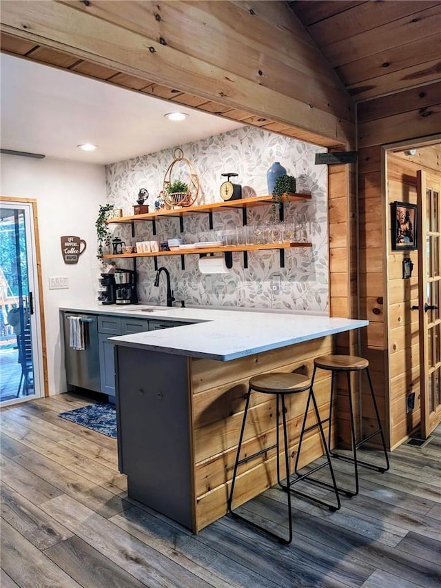 bar with dishwasher, wood ceiling, dark hardwood / wood-style floors, and sink