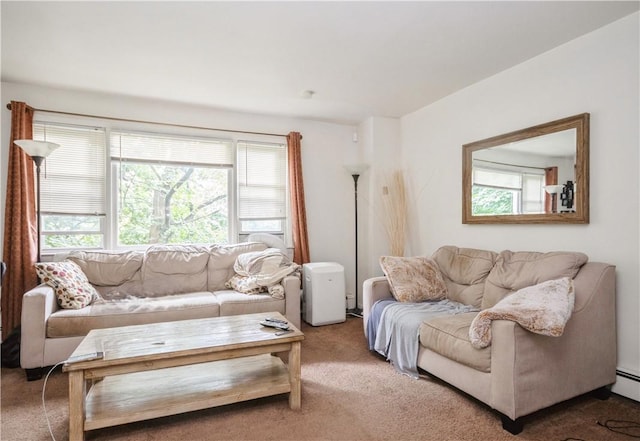 living room with carpet flooring and a baseboard heating unit