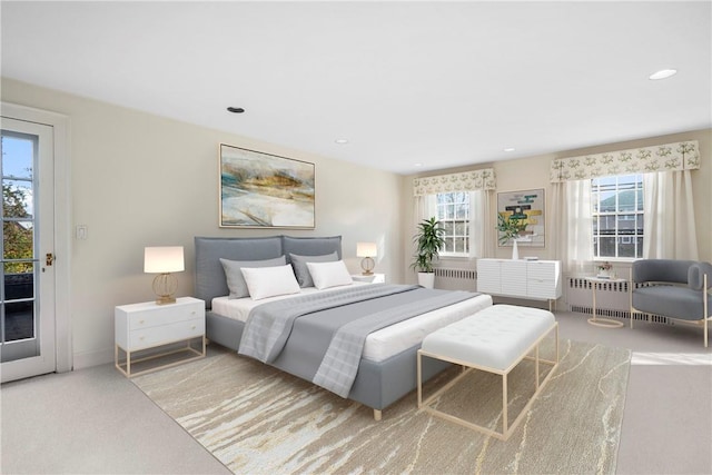 290 Overlook Rd, New Rochelle, NY 10804 - carpeted bedroom featuring radiator, multiple windows, recessed lighting, and baseboards