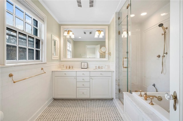 290 Overlook Rd, New Rochelle, NY 10804 - bathroom with a stall shower, a garden tub, double vanity, ornamental molding, and tile patterned floors