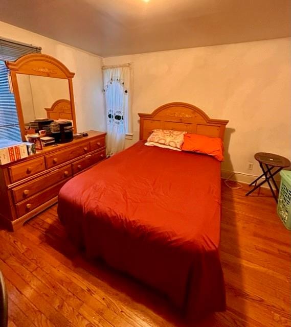 bedroom featuring light wood-type flooring