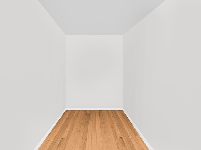 unfurnished room featuring wood-type flooring