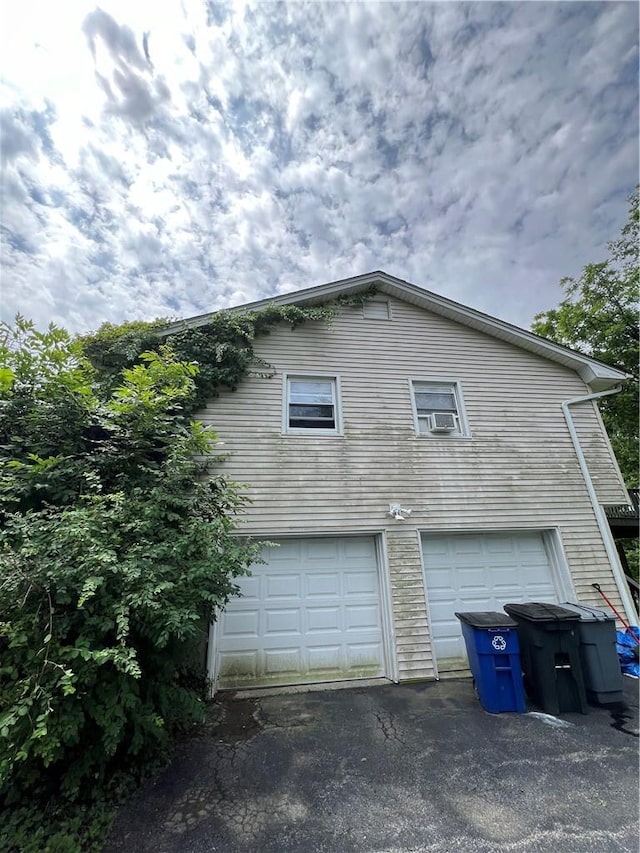 view of home's exterior featuring a garage