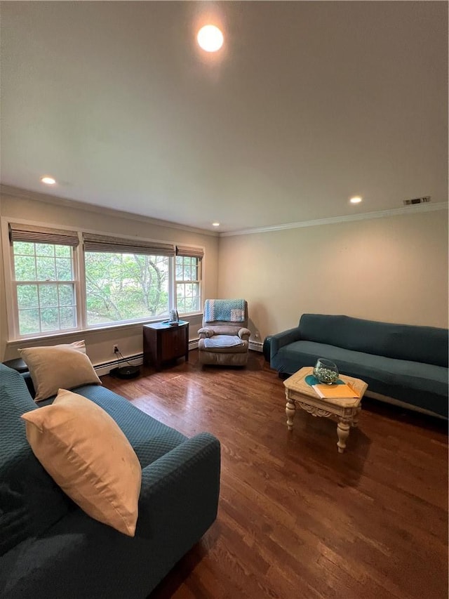 living room with crown molding, baseboard heating, and dark wood-type flooring