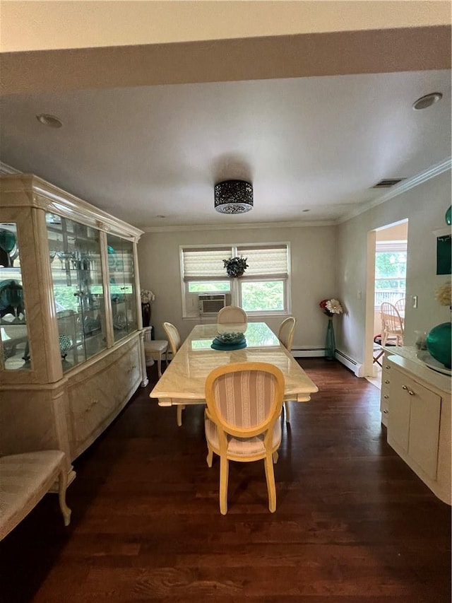 dining room with dark hardwood / wood-style flooring, crown molding, and plenty of natural light