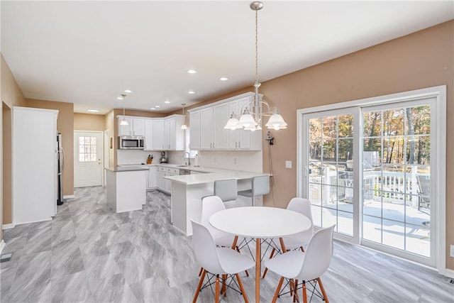 dining area featuring sink