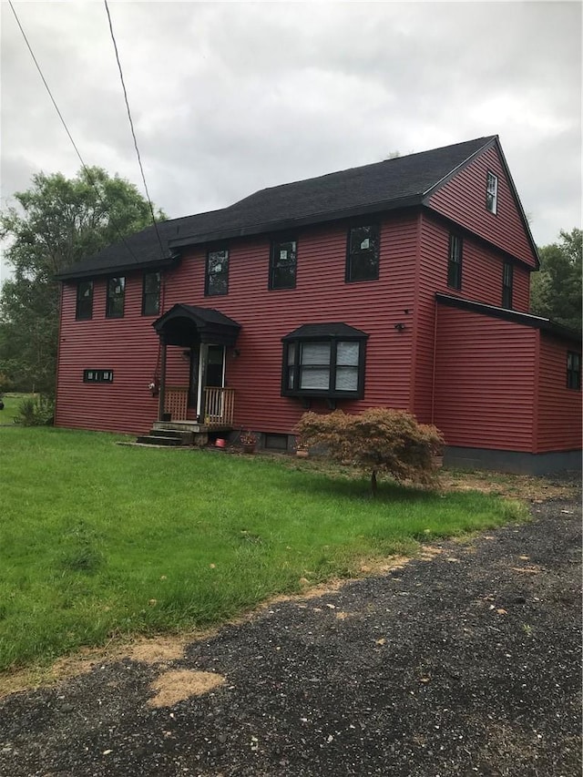 view of front of home with a front yard