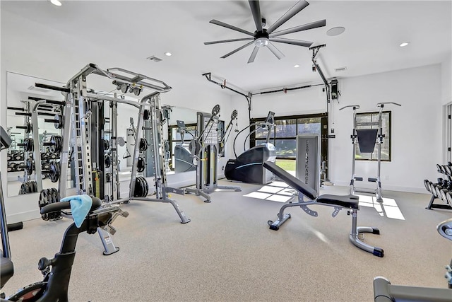 exercise room with ceiling fan