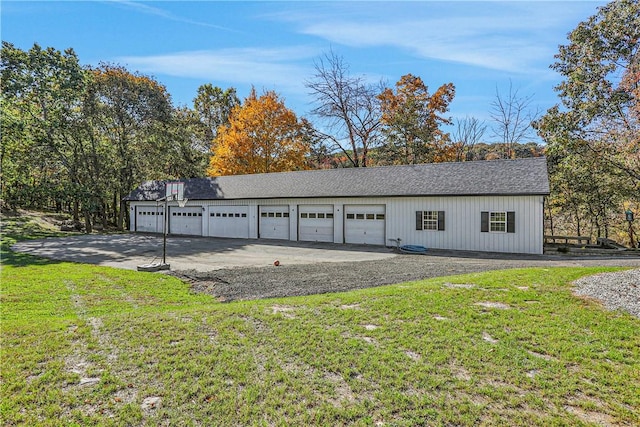 garage with a lawn