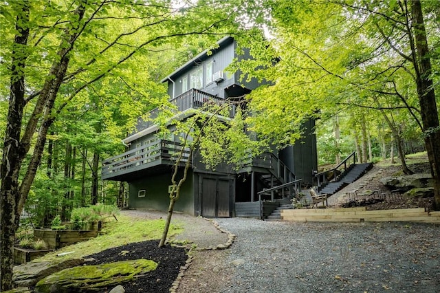 view of home's exterior featuring a deck