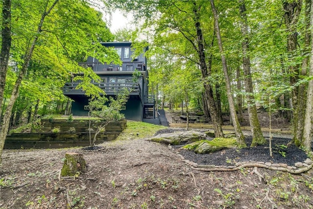 view of yard with a wooden deck