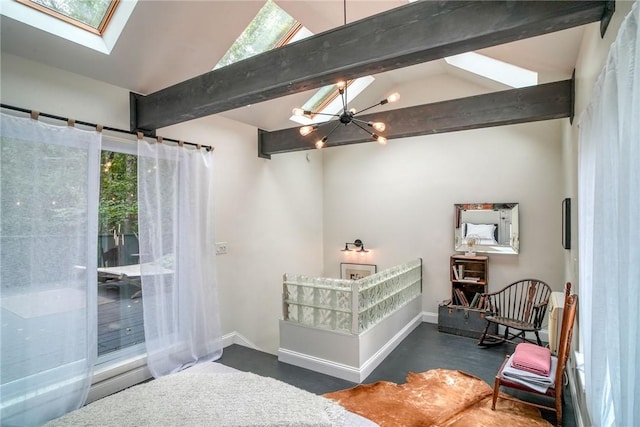 bedroom with multiple windows, vaulted ceiling with skylight, and a chandelier