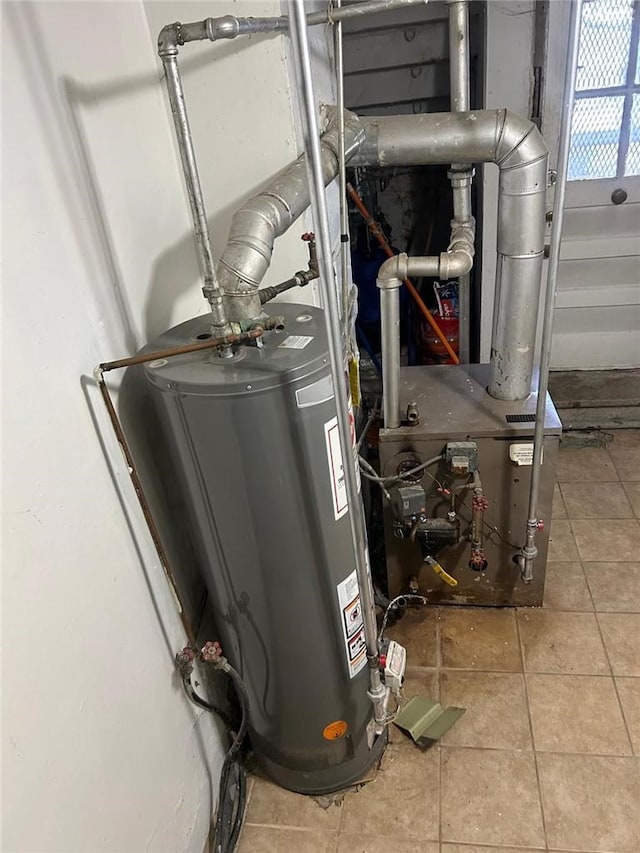 utility room with water heater