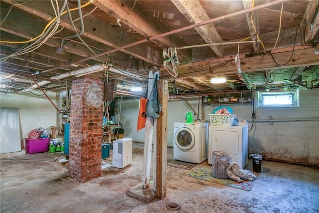 basement featuring washer and clothes dryer