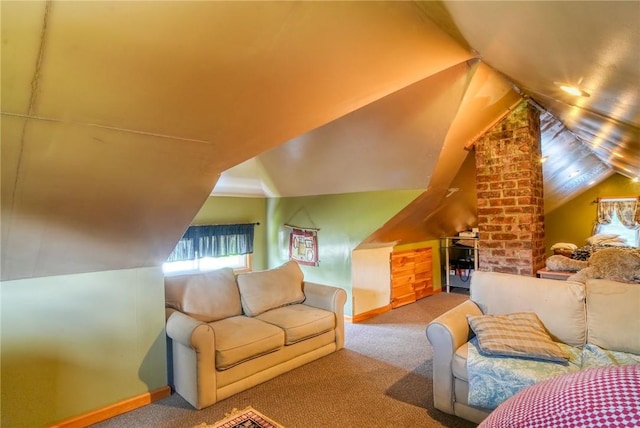 carpeted living room with lofted ceiling