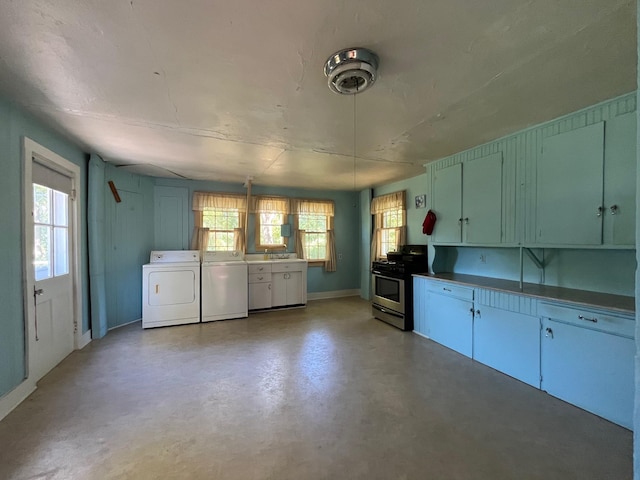 kitchen with gas stove and a wealth of natural light