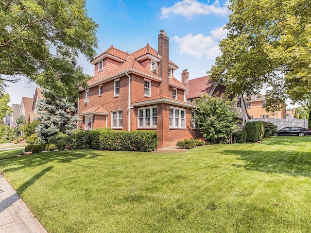 exterior space with a front lawn