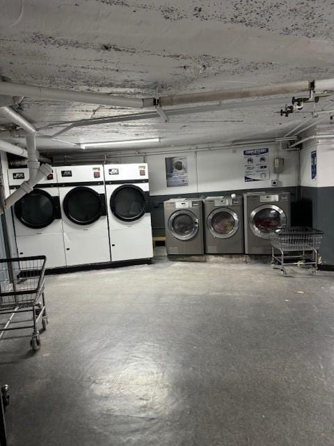 laundry room with independent washer and dryer