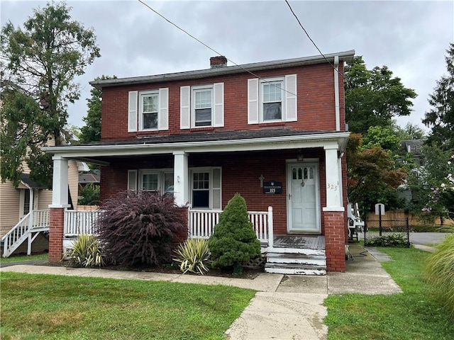 view of front facade with a front yard