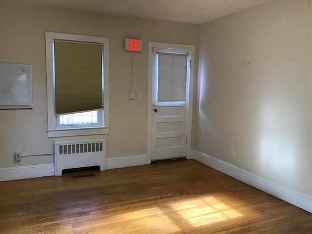 empty room featuring wood ceiling