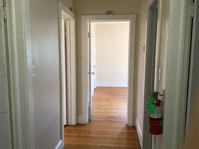 hallway featuring wooden ceiling