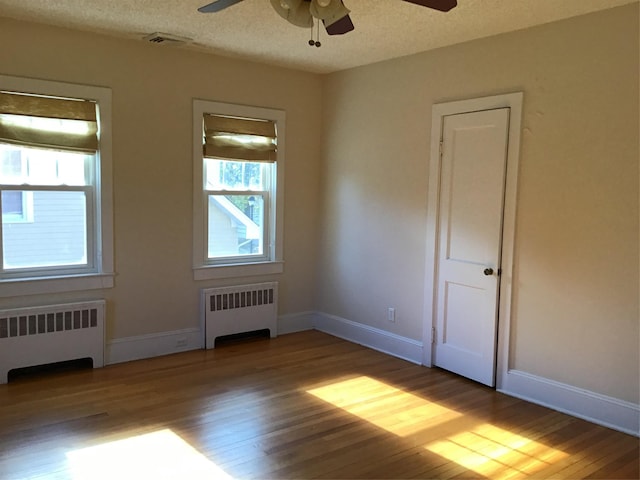 interior space with crown molding, a healthy amount of sunlight, and wood ceiling