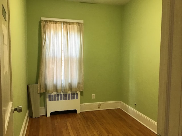 spare room with wood ceiling and crown molding