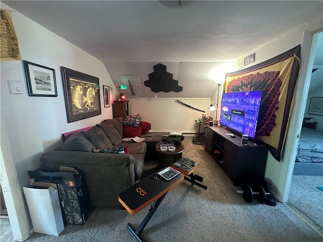 carpeted living room featuring lofted ceiling