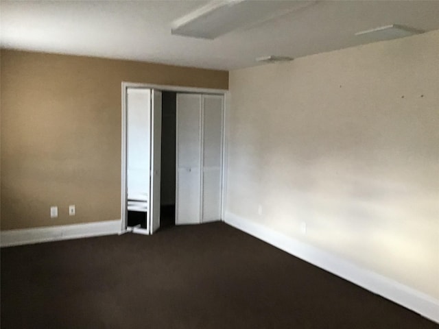 unfurnished bedroom with a closet