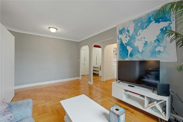 living room with parquet floors and ornamental molding