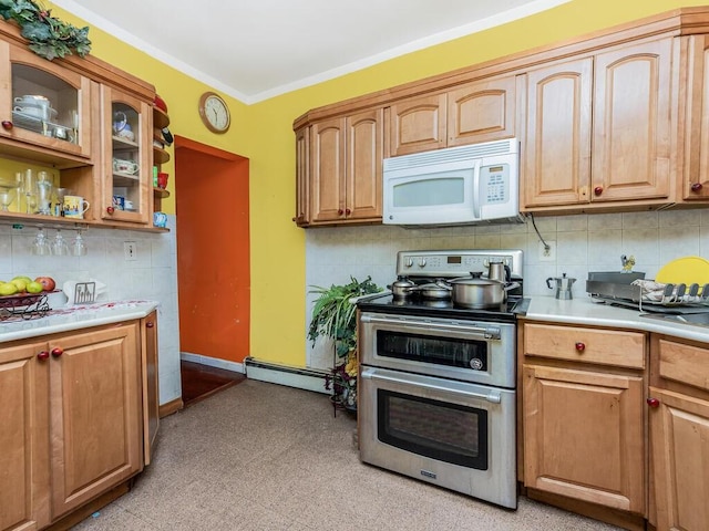 kitchen with backsplash, crown molding, range with two ovens, and a baseboard heating unit