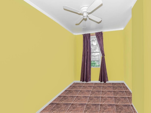 unfurnished room featuring ceiling fan and ornamental molding