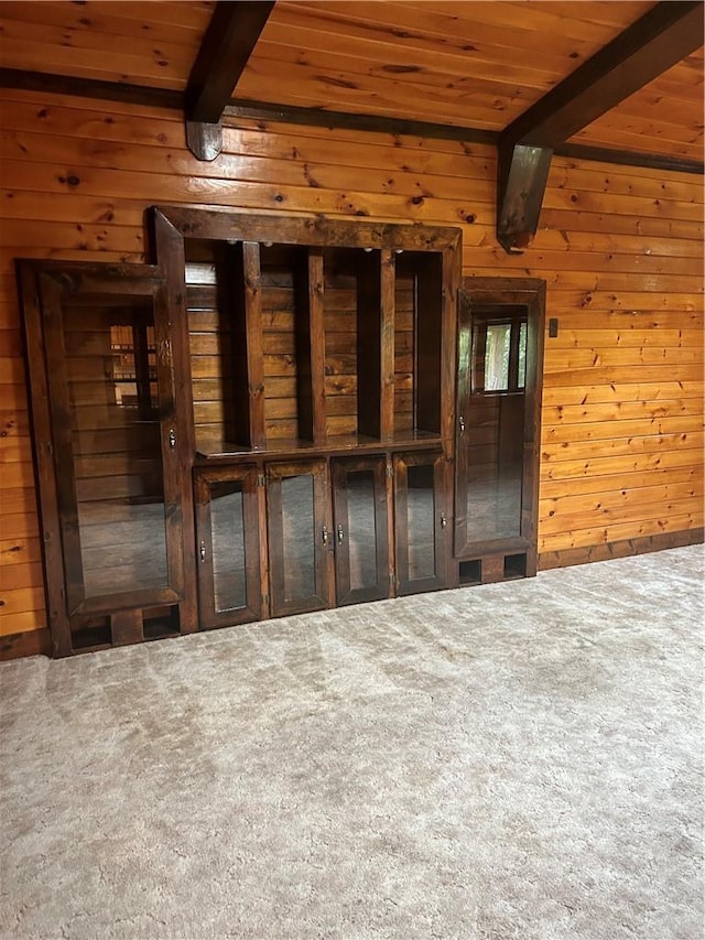 110 Foss Ln, Huguenot, NY 12746 - spare room featuring wood walls, carpet floors, and a wood ceiling with exposed beams