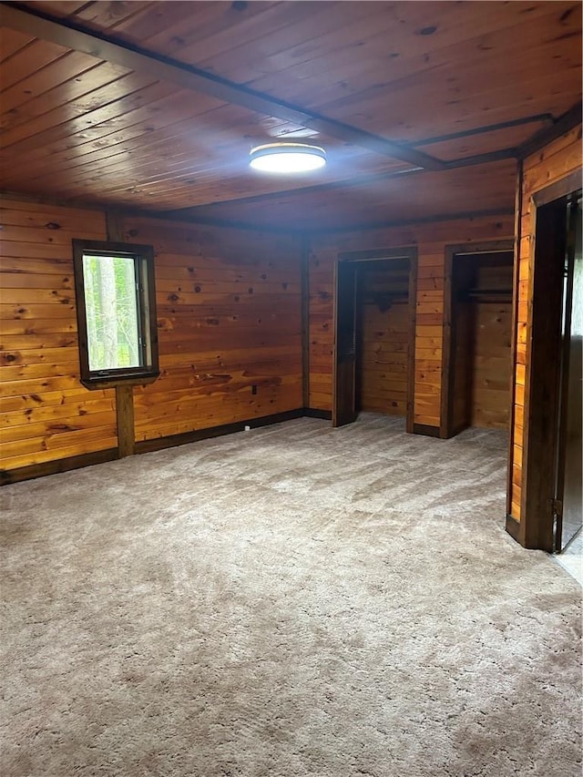110 Foss Ln, Huguenot, NY 12746 - unfurnished bedroom with wood ceiling, carpet floors, and wooden walls