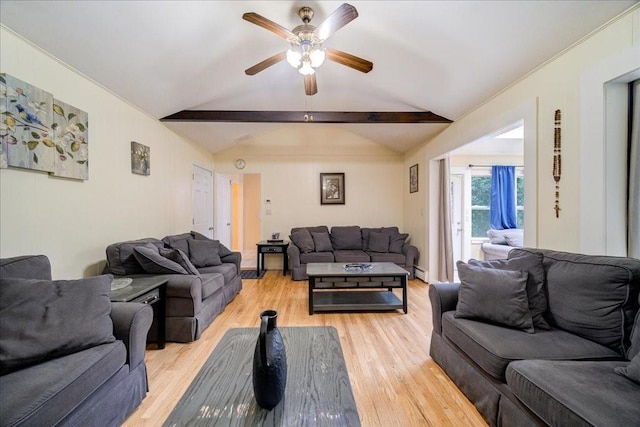 living room featuring lofted ceiling with beams, a baseboard radiator, light hardwood / wood-style flooring, and ceiling fan