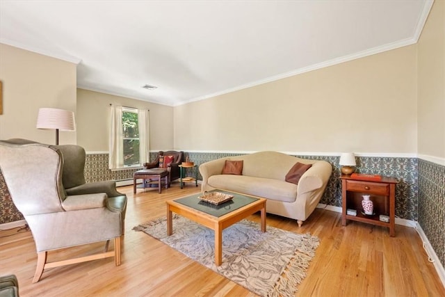 living room with crown molding and wood-type flooring