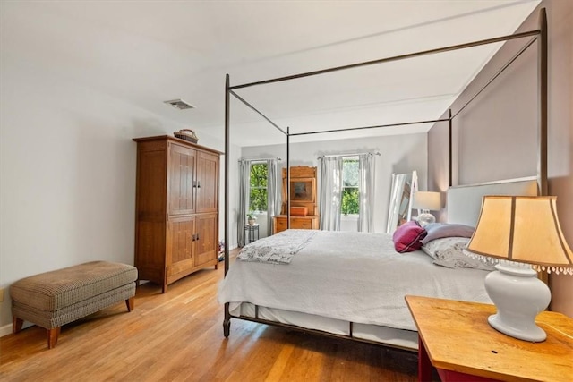 bedroom featuring light hardwood / wood-style flooring