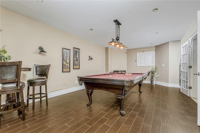 playroom featuring dark hardwood / wood-style floors and billiards