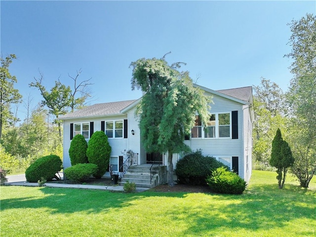 view of front of home with a front yard